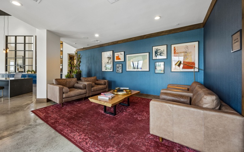 a living room with couches and a coffee table
