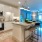 a kitchen with white cabinets