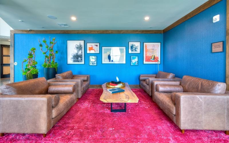 a living room with couches and a coffee table