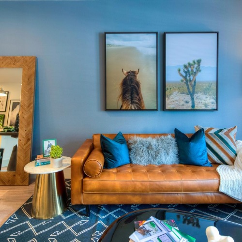 a living room with a couch and a table