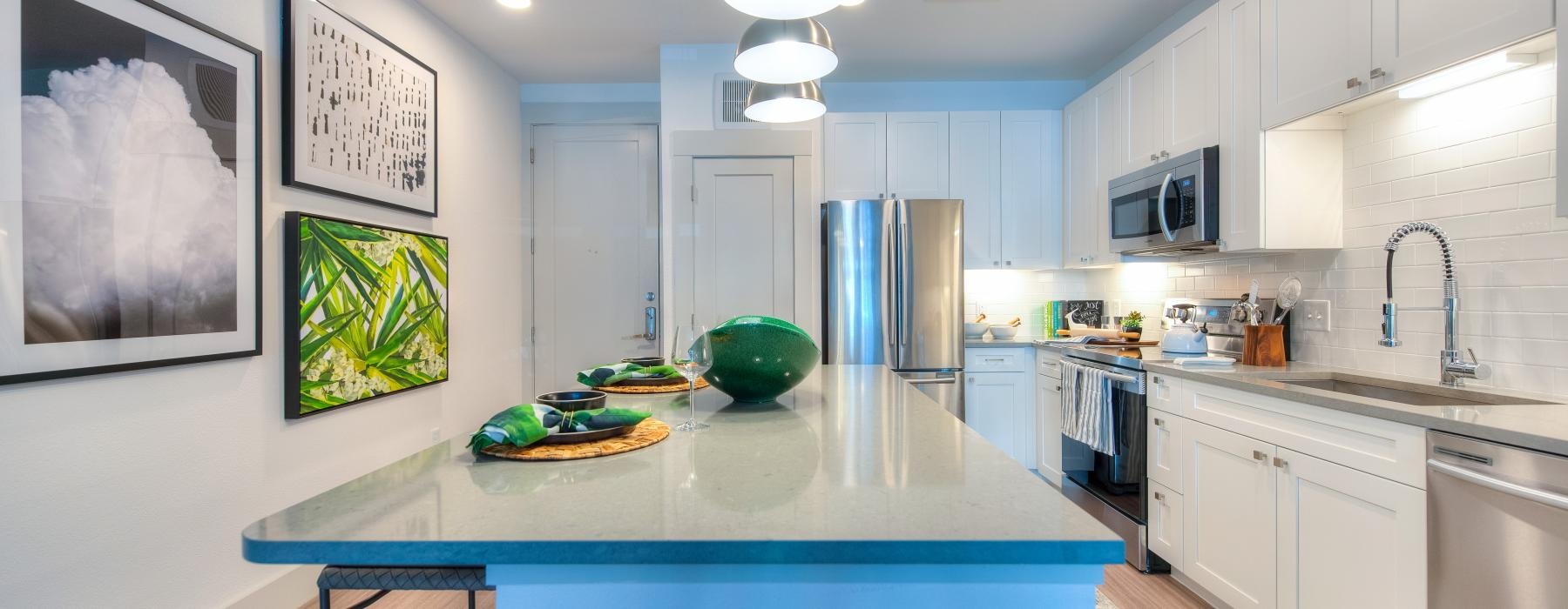 a kitchen with a blue countertop