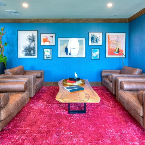 a living room with couches and a coffee table